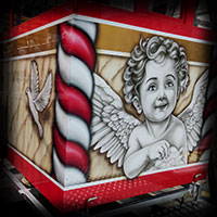 airbrush angels painting on ferris wheel